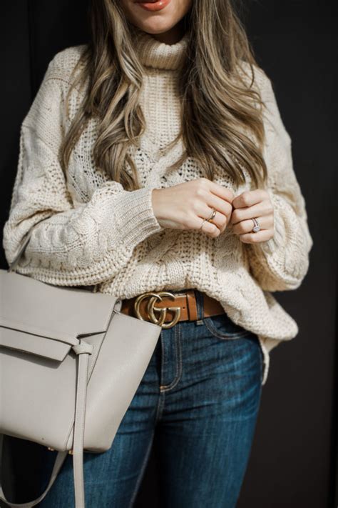 tuck in sweater with belt.